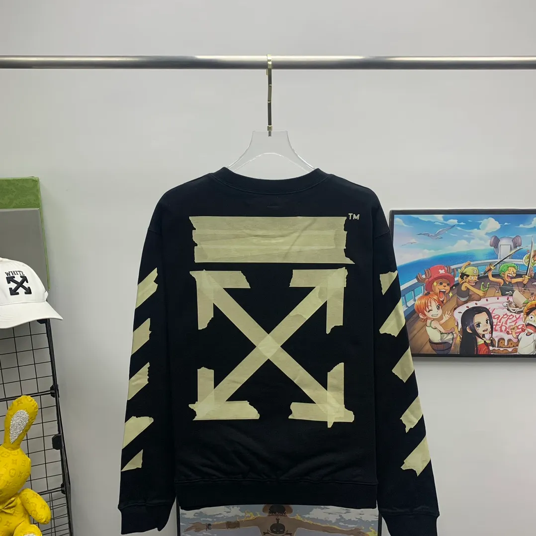 Top tested version OFF WHITE OW hot stamping strip printing male and female couple pure cotton loose same style pullover hooded sweatshirt The printing is done on a Japanese-owned Mimaki printing machine, with no edges or burrs. Inkjet heat transfer is hot-pressed and cold-teared, and the high temperature is 180 degrees. The front piece needs to be pressed twice (the second time requires 180kg of air pressure). The transparent fabric is anti-scratch and ironing, and the printing is fog-free. The semi-transparent tape in the front circle can reveal the part of the printing underneath. The golden printing color of the tape is not The flat color and tape printing overlap have different color depths. The wash label is also customized according to the original font. The accessories still use the full line of correct accessories. The rectangular woven collar label design is cancelled. The previous three-dimensional silicone feel font is changed to a fully woven collar label. Fluorescent fonts can be seen on the collar label. The five-link silicone hangtag, three-link washable label and zebra crossing packaging line are still the same. 480g pure cotton terry fabric, a major launch with full drape. A full set of customized accessories, one-to-one mold opening, professional ow. Size: XS-L Size chart